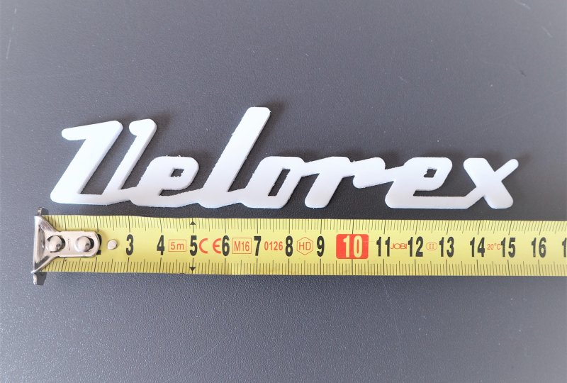 Emblemat VELOREX, plastik, biały-photo2