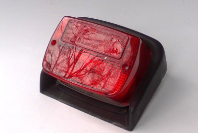 Lampa tylna, czerwona, z osłoną, oryginał, Jawa 640